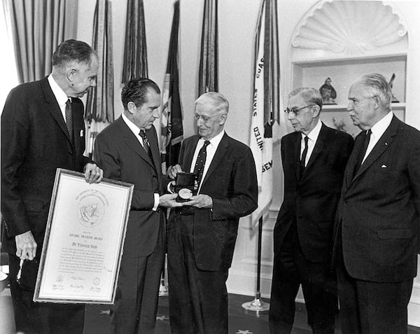 Vannevar Bush (middle) receives the Atomic Pioneers Award